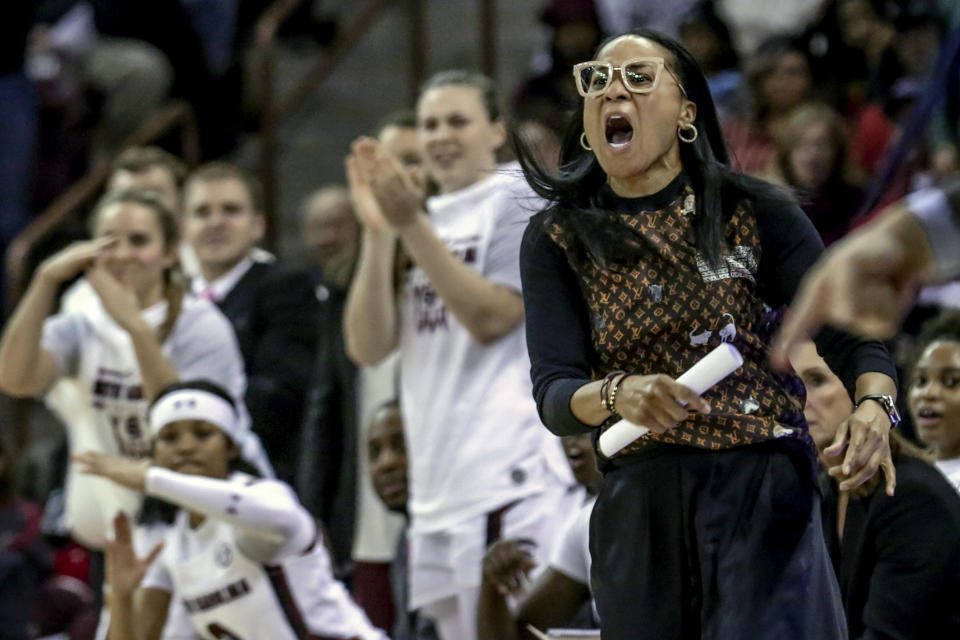 FILE - In this Jan. 2, 2020, file photo, South Carolina coach Dawn Staley disputes a call during the second half of an NCAA college basketball game against Kentucky in Columbia, S.C. Staley was announced as The Associated Press women's basketball coach of the year Monday, March 23, 2020. (Tracy Glantz/The State via AP, File)