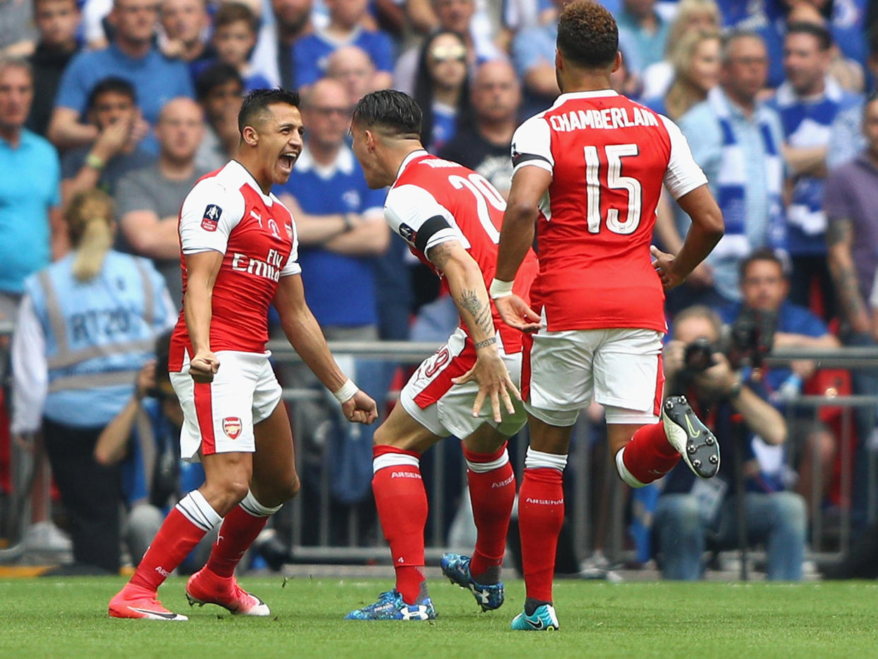 Alexis Sanchez celebrates putting Arsenal ahead in controversial circumstances early on: Getty