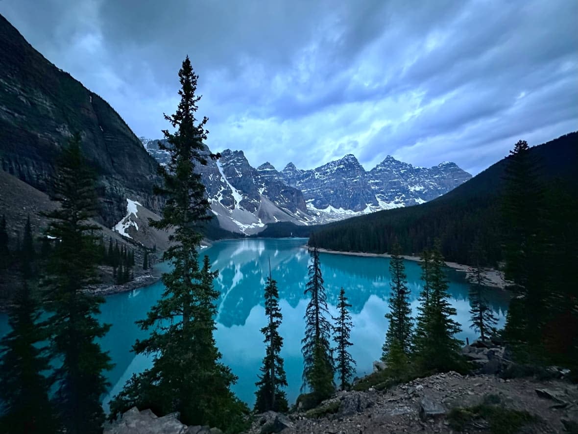 Moraine Lake pictured on June 1. Shuttle services are now open to bring visitors to the popular Alberta tourist destination. (Christine Cook/Moraine Lake Sunrise Shuttle - image credit)