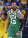 Boston Celtics forward Marcus Morris (13) celebrates during the second half of Game 4 against the Indiana Pacers in the NBA basketball first-round playoff series in Indianapolis, Sunday, April 21, 2019. The Celtics defeated the Pacers 110-106 to win the series 4-0. (AP Photo/Michael Conroy)