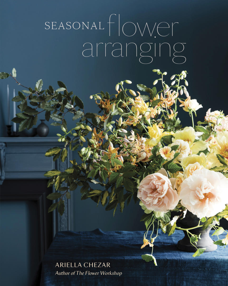 This photo shows the cover of the book "Seasonal Flower Arranging: Fill Your Home with Blooms, Branches, and Foraged Materials All Year Round" by Ariella Chezar. As environmental awareness grows, many couples are saying "I do" to Zero-Waste weddings. They're trying to cut back on trash _ everything from floral design and dresses to invitations and food. (Ten Speed Press via AP)