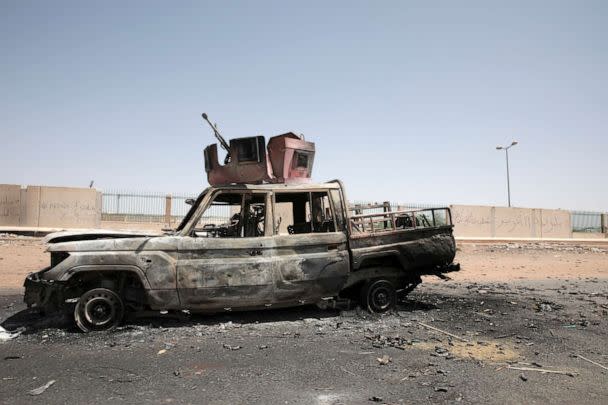 PHOTO: A destroyed military vehicle is seen in southern in Khartoum, Sudan, April 20, 2023. (Marwan Ali/AP)