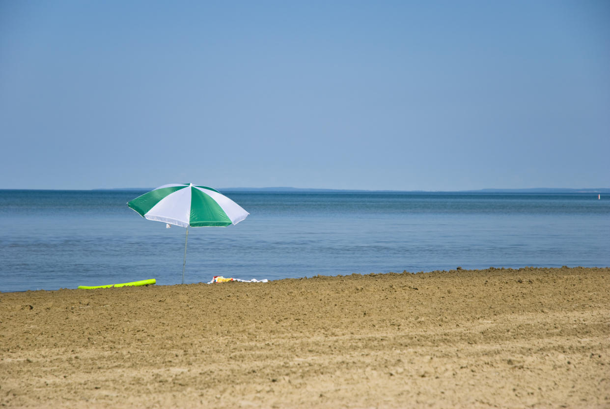 Lonely umbrella on the beach