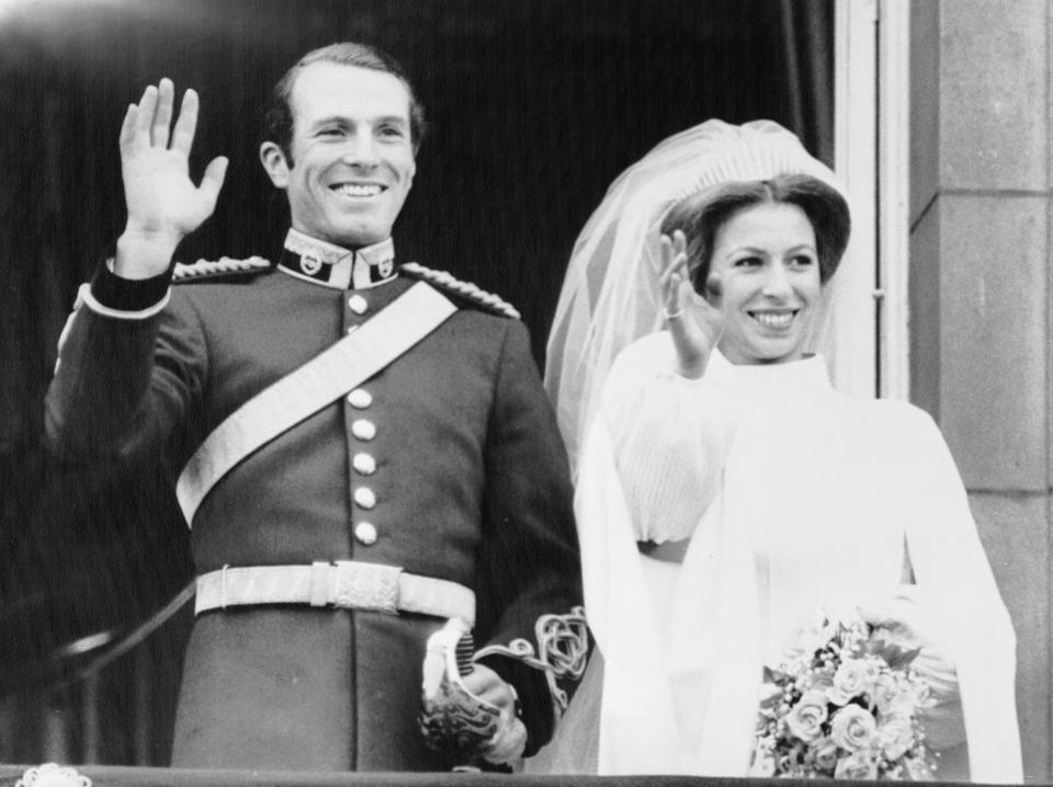 (Original Caption) LONDON: Princess Anne and Capt. Mark Phillips wave to cheering crowds from the balcony of Buckingham Palace, Nov. 14th, after their wedding at Westminster Abbey.