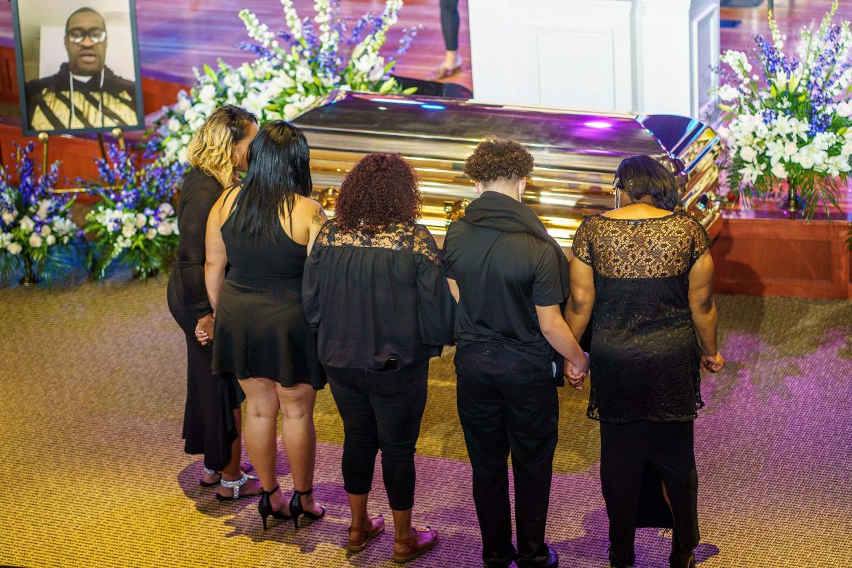 People shows their respects to the remains of George Floyd awaiting a memorial service in his honor on June 4, 2020 at North Central University's Frank J. Lindquist Sanctuary in Minneapolis, Minnesota.