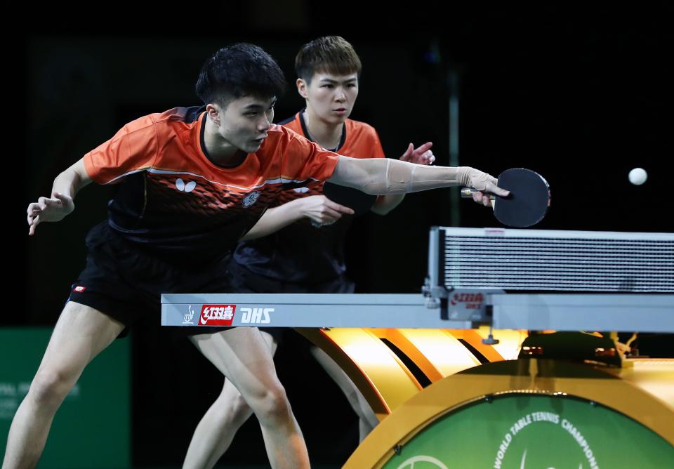 林昀儒與陳思羽出戰ITTF世界桌球錦標賽混雙項目。(Photo by Wang Dongzhen/Xinhua via Getty Images)