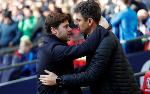 Mauricio Pochettino with Mauricio Pellegrino  - Credit: Reuters