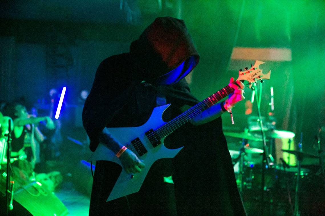 Guitarist The Seer uncorks another synthwave riff at a Magic Sword show.