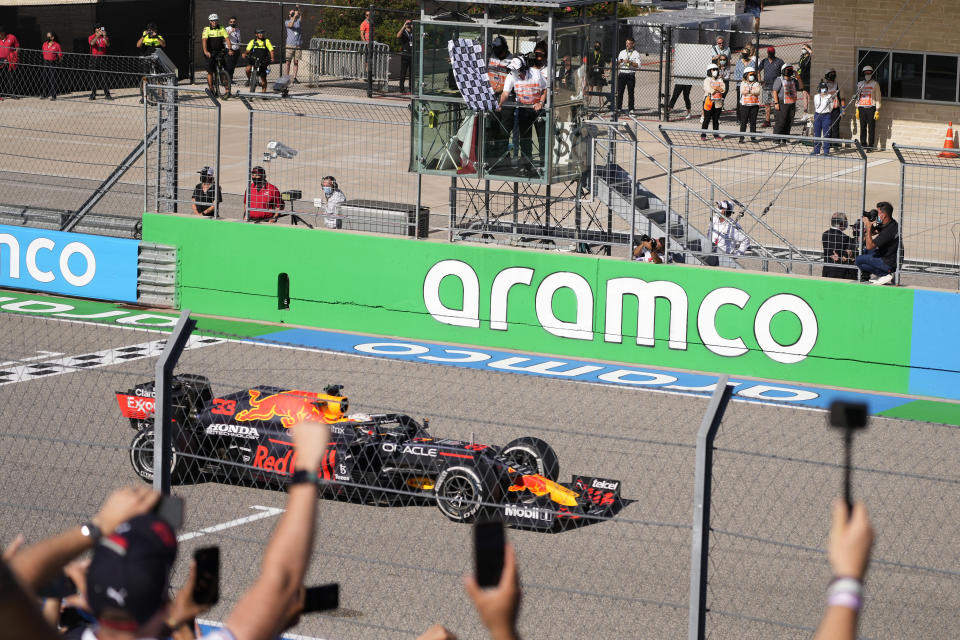 Red Bull driver Max Verstappen, of the Netherlands, wins the Formula One U.S. Grand Prix auto race at the Circuit of the Americas, Sunday, Oct. 24, 2021, in Austin, Texas. (AP Photo/Nick Didlick)