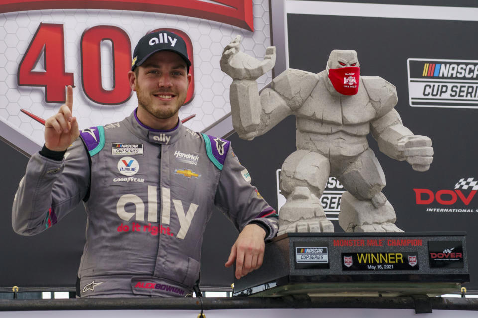 Alex Bowman celebrates the win following a NASCAR Cup Series auto race at Dover International Speedway, Sunday, May 16, 2021, in Dover, Del. Alex Bowman wins the race. (AP Photo/Chris Szagola)