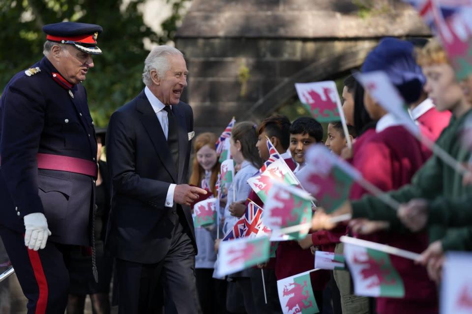Charles met members of the local community on a walk around Cathedral Green (Frank Augstein/PA) (PA Wire)