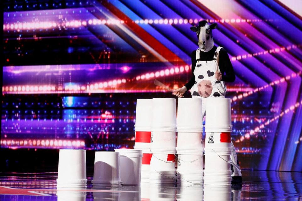 Another performer, Mr. Moo Shakes donned a cow mask and overalls while quickly played the drums on stacks of buckets.