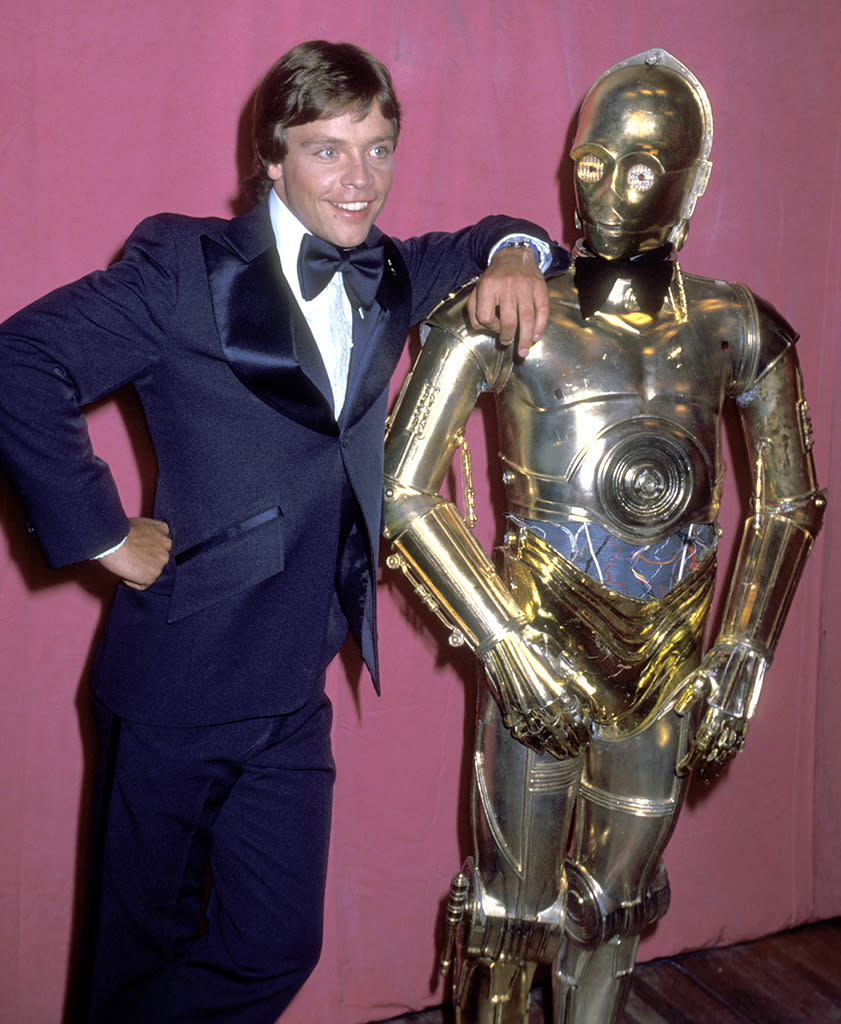 <p>After presenting the Special Achievement Award, Hamill and C-3PO posed for photographers on April 3, 1978. (Photo: Ron Galella/WireImage)</p>