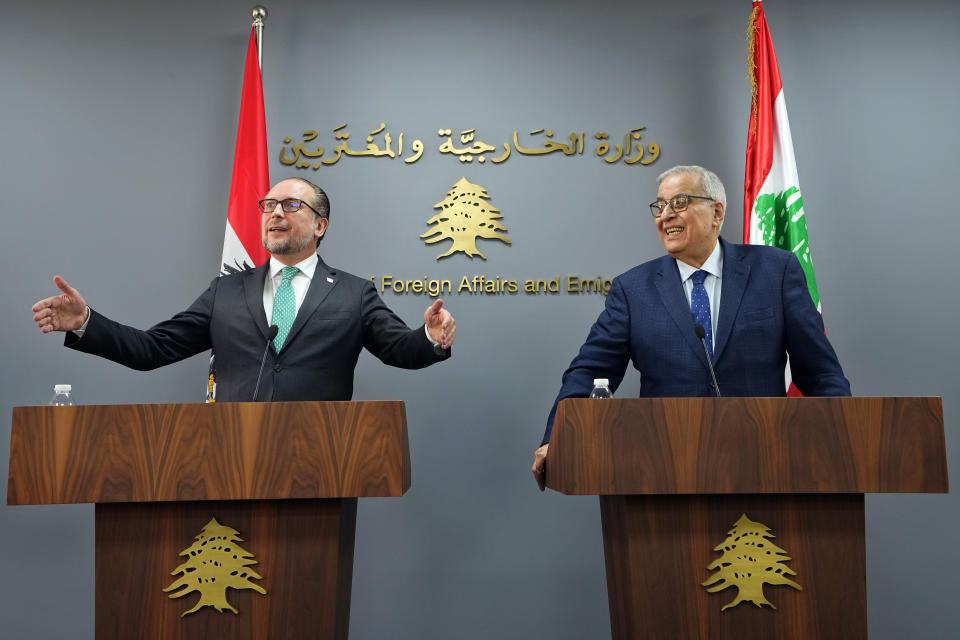 Austrian Foreign Minister Alexander Schallenberg, left, speaks to journalists during a joint press conference with his Lebanese counterpart Abdallah Bouhabib in Beirut, Lebanon, Thursday, Feb. 29, 2024. Schallenberg urged Israel and Lebanon's militant Hezbollah group not to escalate the conflict along the border saying Thursday that the Middle East has witnessed enough devastation and cruelty. (AP Photo/Bilal Hussein)