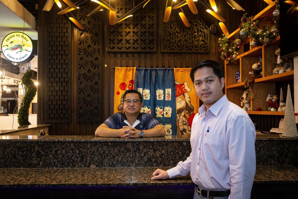 New Corpus Christi restaurant BO BBQ Korean Grill & Bar co-owners Tony Pham, left, and Nhieu Bo stand at the sushi bar, which is still under construction, on Wednesday, Dec. 29, 2021.