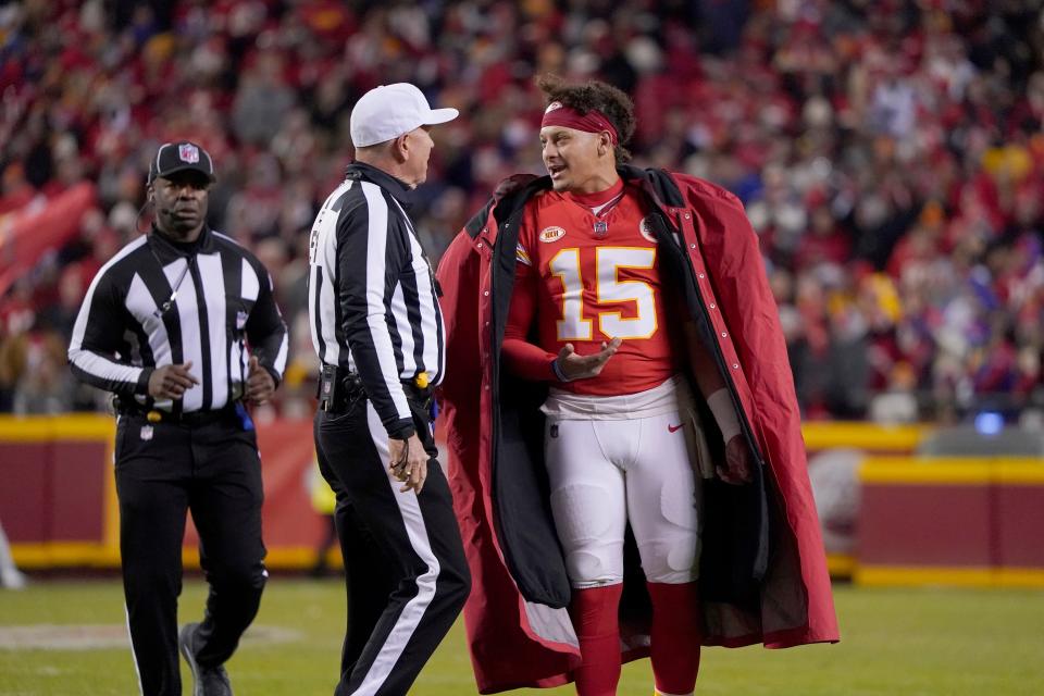 Kansas City Chiefs quarterback Patrick Mahomes (15) talks with an official during the second half of an NFL football game against the Buffalo Bills Sunday, Dec. 10, 2023, in Kansas City, Mo.