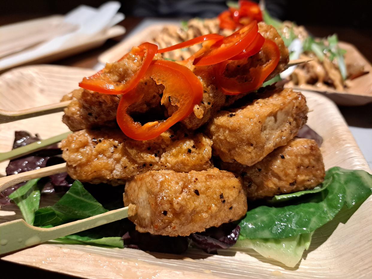 At Das Box, pressed-dried tofu is wet-dipped in a soy-based marinade that is then coated in a gluten-free combination of rice flour, cornstarch, and other seasonings before frying or grilling.