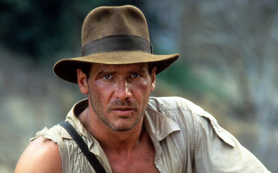 Harrison Ford, hier 1984 bei den Dreharbeiten zu "Indiana Jones und der Tempel des Todes" zu sehen, verkörpert seit 1981 den Archäologen Dr. Henry Jones. (Bild: 2012 Getty Images/Paramount Pictures)