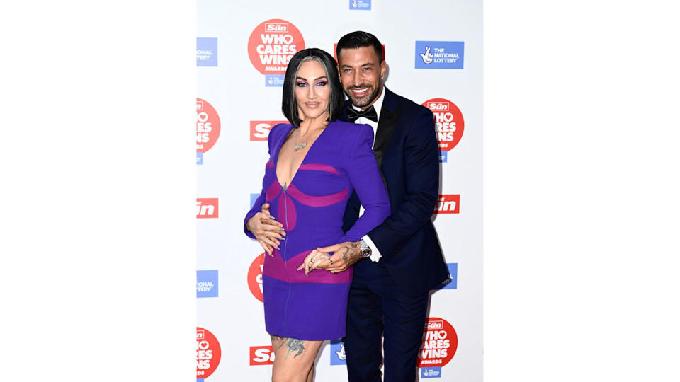 Michelle Visage and Giovanni Pernice cuddle up on the red carpet