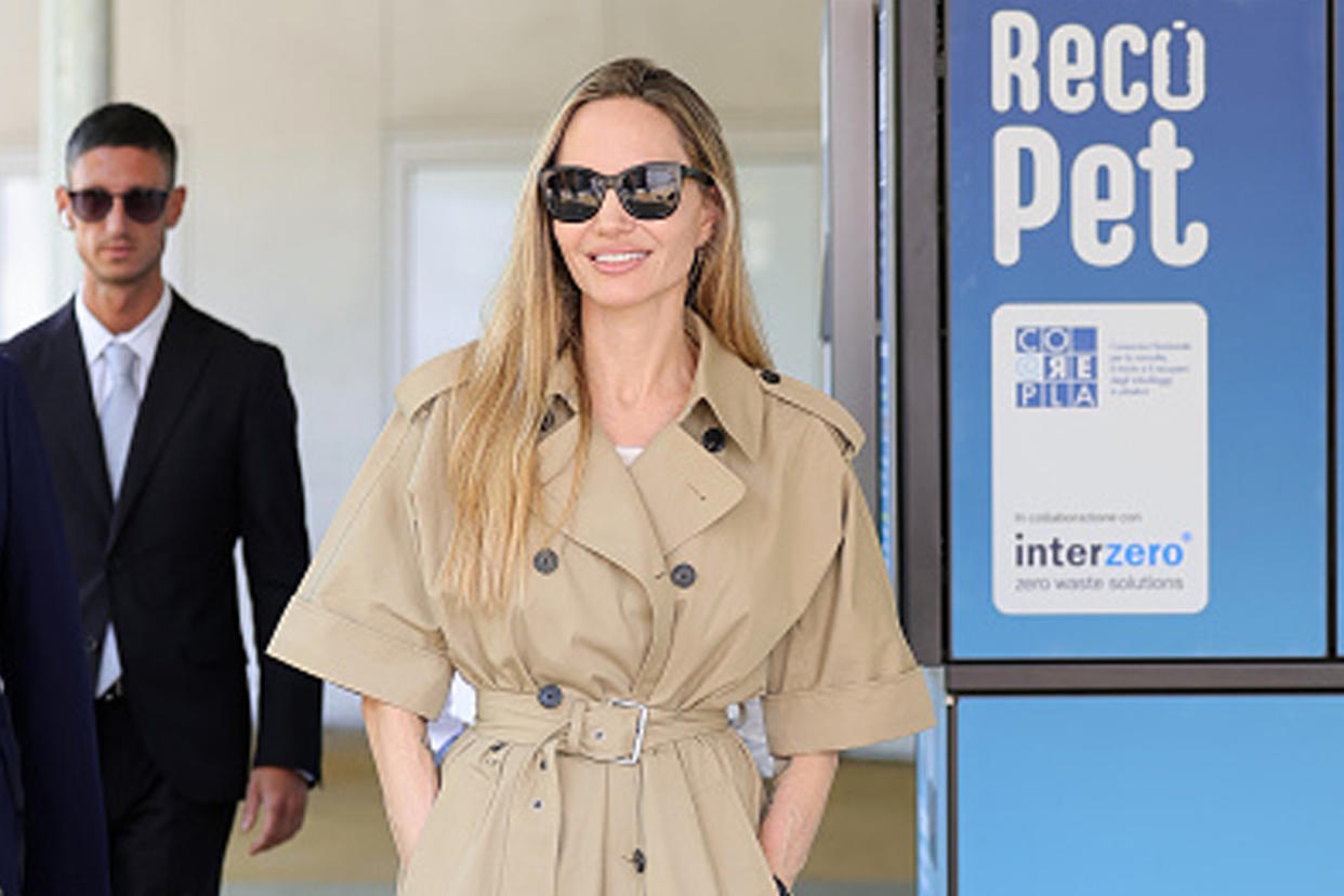 angelina jolie in beige trench coat