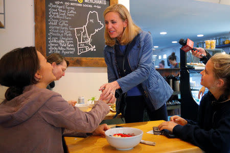 Democratic candidate for the U.S. Congress Maura Sullivan greets voters at Laney & Lu in Exeter, New Hampshire, U.S., September 10, 2018. REUTERS/Brian Snyder