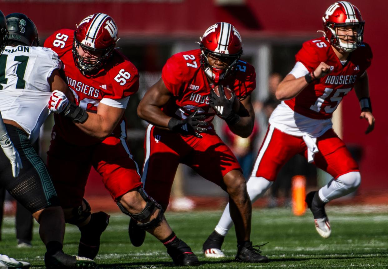 Indiana's Trent Howland (27) runs during the first half of the Indiana versus Michigan State football game at Memorial Stadium on Saturday, Nov. 18, 2023.