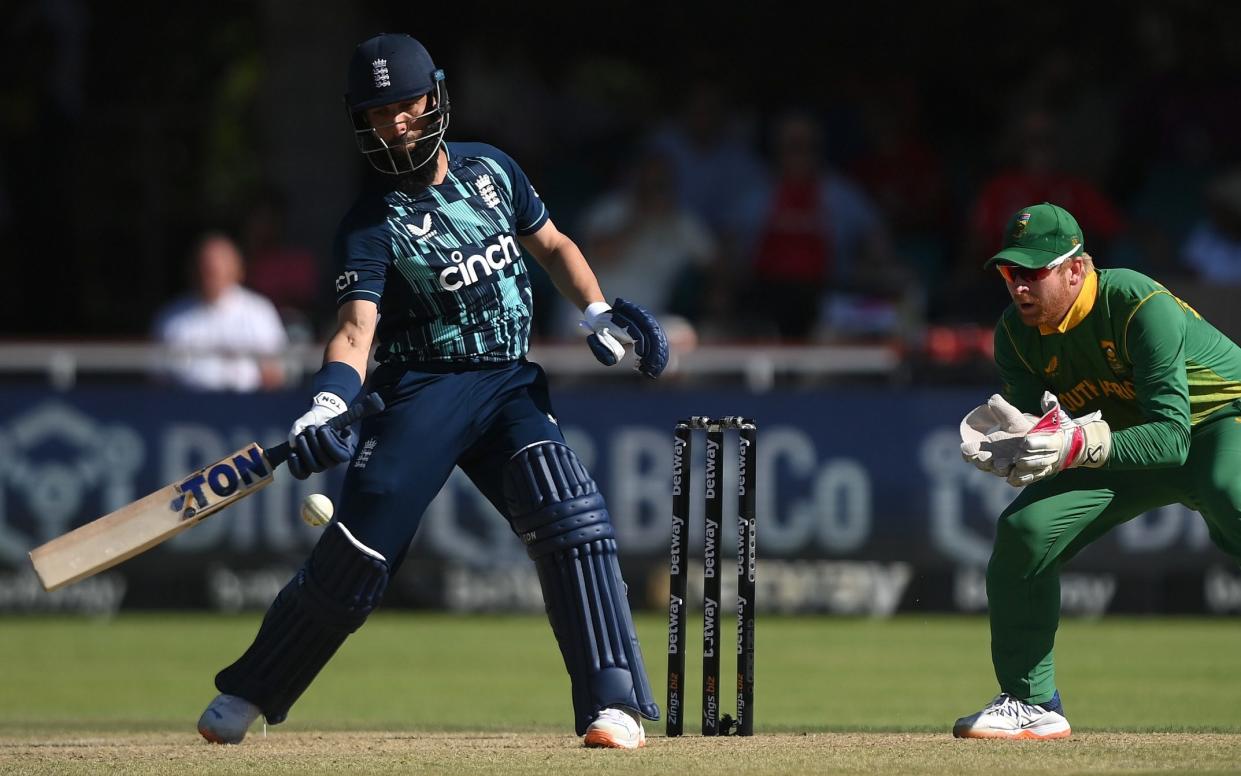 Moeen Ali tries to swat the ball one-handed - Alex Davidson/Getty Images