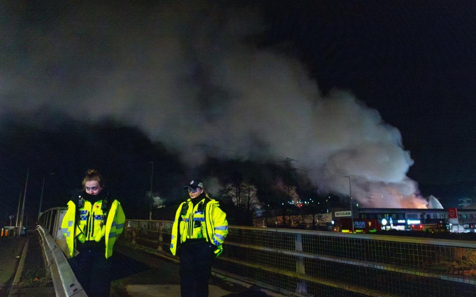 Police close roads near a fire at the Treforest Industrial Estate