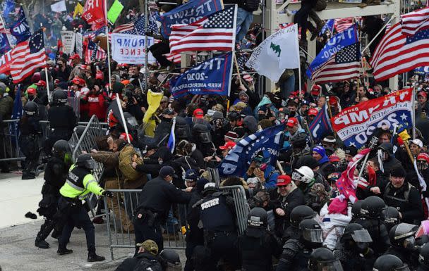 PHOTO: Trump supporters clash with police and security forces as they push barricades to storm the Capitol, Jan. 6, 2021. (Roberto Schmidt/AFP via Getty Images)