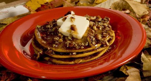 Pumpkin pancakes with maple syrup are a tasty treat. (Bo Rad