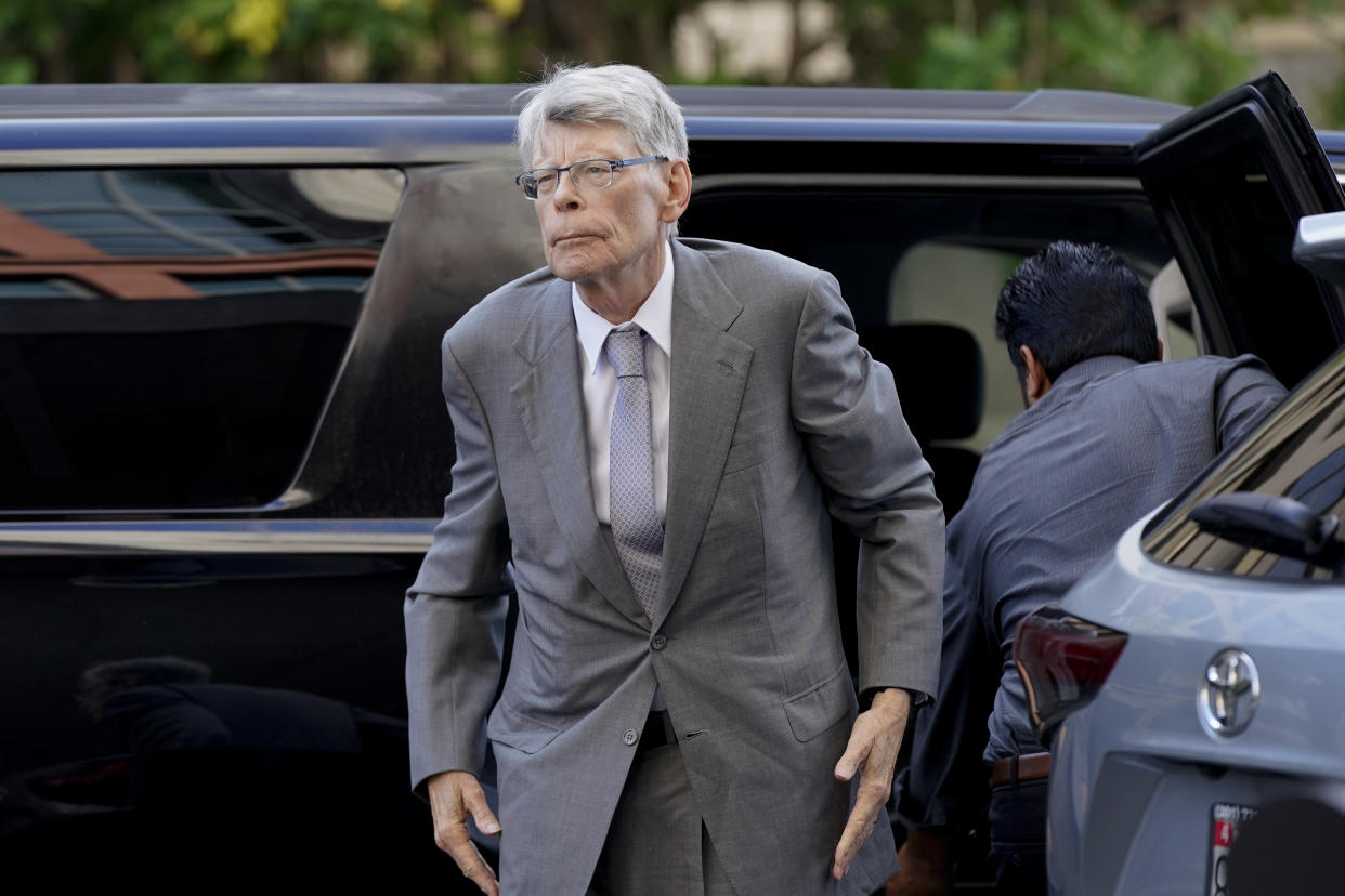 Author Stephen King arrives at federal court before testifying for the Department of Justice as it bids to block the proposed merger of two of the world's biggest publishers, Penguin Random House and Simon & Schuster, Tuesday, Aug. 2, 2022, in Washington. (AP Photo/Patrick Semansky)