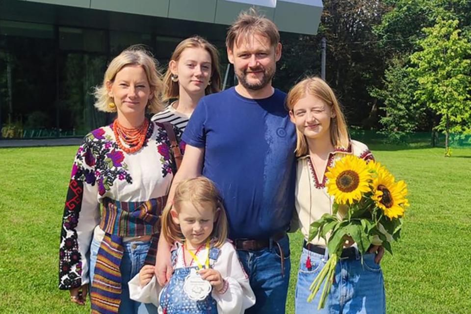 This handout photograph posted by Eugenia Bazylevych on her Facebook page on September 1, 2023 shows Eugenia Bazylevych (L), her husband Yaroslav Bazylevych (C) and their three daughters following a ceremony to mark the start of the new school year in Lviv (AFP/Getty)