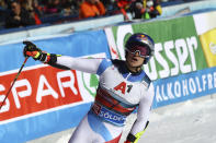Switzerland's Marco Odermatt celebrates after crossing the finish line during an alpine ski, men's World Cup giant slalom, in Soelden, Austria, Sunday, Oct. 24, 2021. (AP Photo/Marco Trovati)