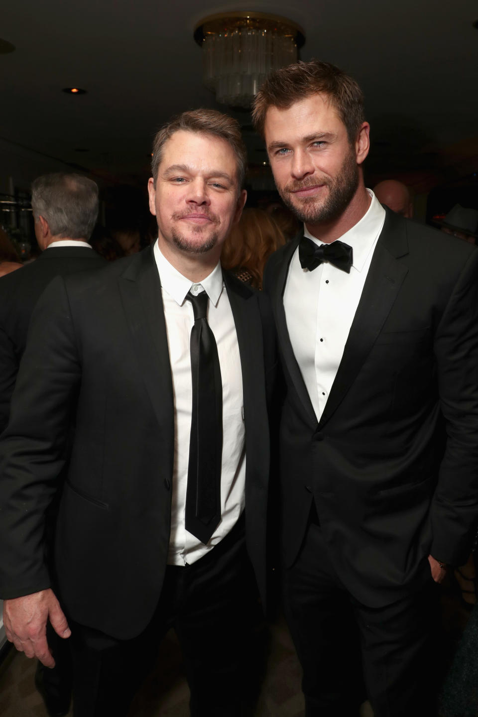 Image of Matt Damon and Chris Hemsworth