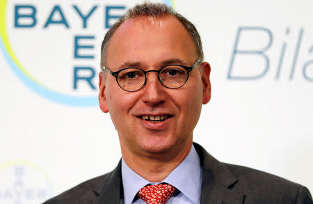 FILE PHOTO: Werner Baumann, CEO of Bayer AG poses for a picture during the annual results news conference of the German drugmaker in Leverkusen, Germany February 27, 2019. REUTERS/Wolfgang Rattay/File Photo