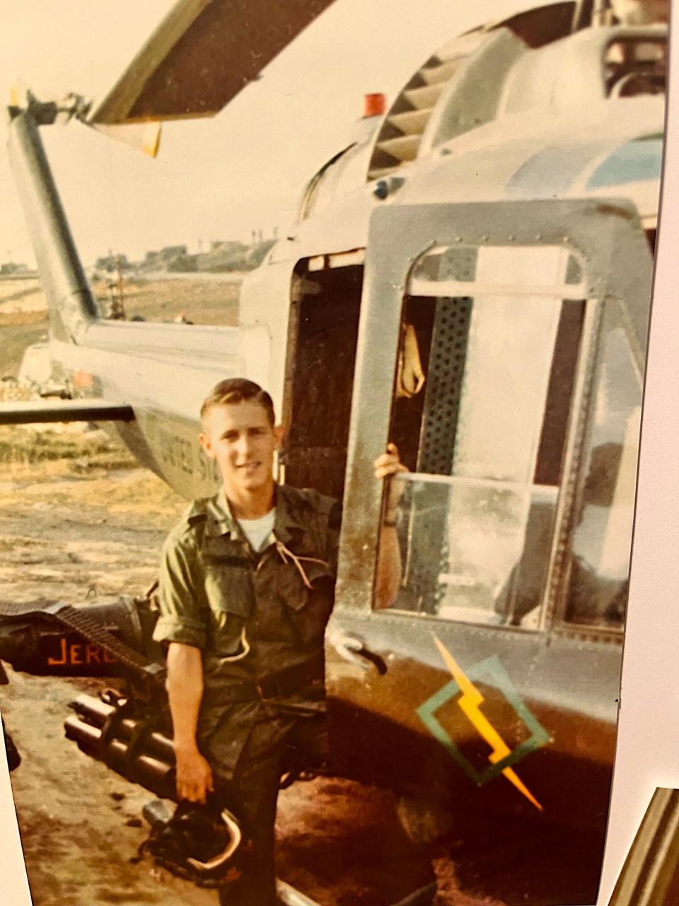 Ric Sawyer with his helicopter in Vietnam in 1968.