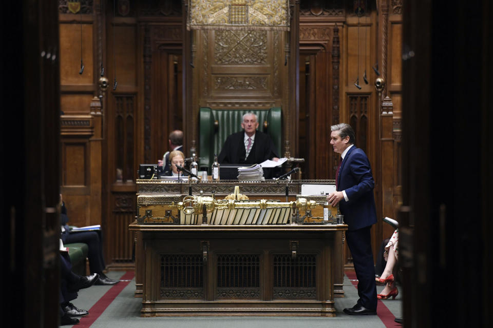 In this handout photo provided by UK Parliament, Britain's Labour party leader Keir Starmer speaks during Prime Minister's Questions in the House of Commons, London, Wednesday, May 13, 2020. (Jessica Taylor/UK Parliament via AP)