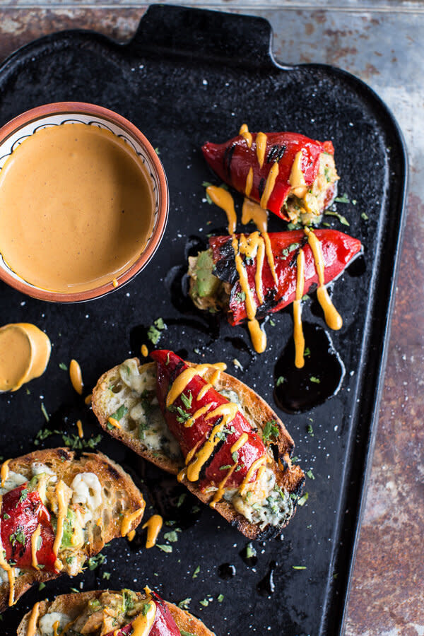 <strong>Get the <a href="http://www.halfbakedharvest.com/cheesy-avocado-crab-stuffed-piquillo-pepper-ciabatta-pizzettes-with-sriracha-aioli/" target="_blank">Cheesy Avocado Crab Stuffed Piquillo Pepper Ciabatta Pizzette's recipe</a> from Half Baked Harvest</strong>