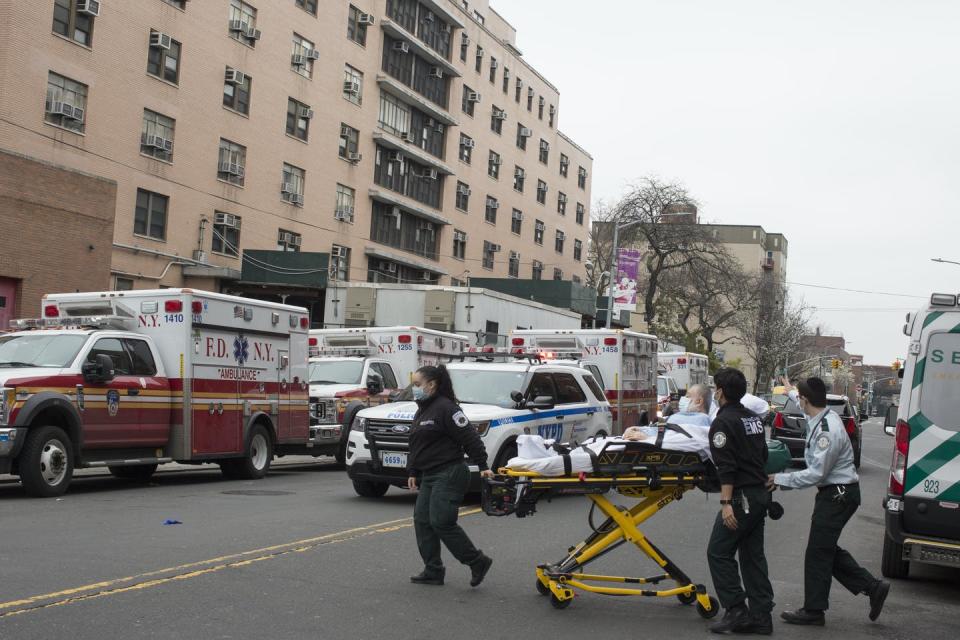 <span class="caption">Outside Elmhurst Hospital’s trauma unit, where ambulances drop off many of the sick during the worst weeks of the pandemic.</span> <span class="attribution"><a class="link " href="https://www.gettyimages.com/detail/news-photo/the-scene-outside-of-elmhurst-hospitals-trauma-unit-remains-news-photo/1215793277?adppopup=true" rel="nofollow noopener" target="_blank" data-ylk="slk:Getty Images / Andrew Lichtenstein;elm:context_link;itc:0;sec:content-canvas">Getty Images / Andrew Lichtenstein</a></span>