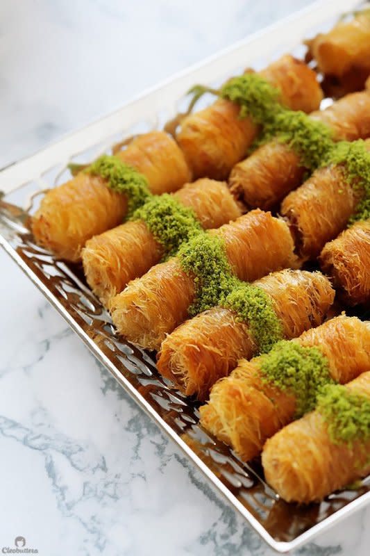 <p>Creamy ricotta cheese wrapped inside golden, crunchy strands of sticky sweet kunafa. A sprinkling of vibrantly green pistachios add the finishing touch to this handheld delicacy.</p><p><strong>Get the recipe: <a href="https://cleobuttera.com/middle-eastern/ricotta-kunafa-rolls/" rel="nofollow noopener" target="_blank" data-ylk="slk:Ricotta Kunafa Rolls;elm:context_link;itc:0;sec:content-canvas" class="link ">Ricotta Kunafa Rolls</a></strong></p>