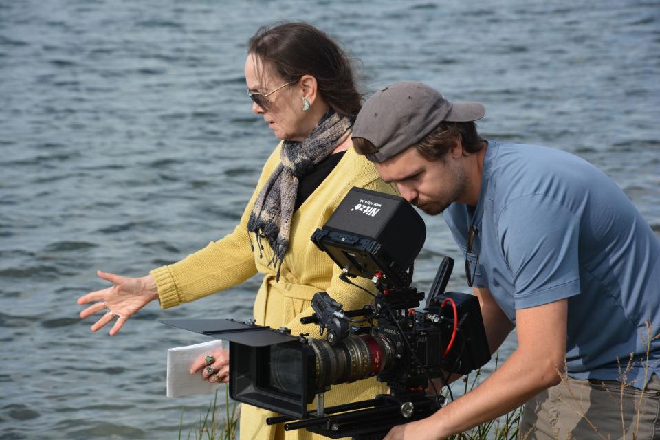 Barbara Neri, director and screenwriter of the "Unlocking Desire," and director of photography Peter Poulos film a scene for the film project on Belle Isle.