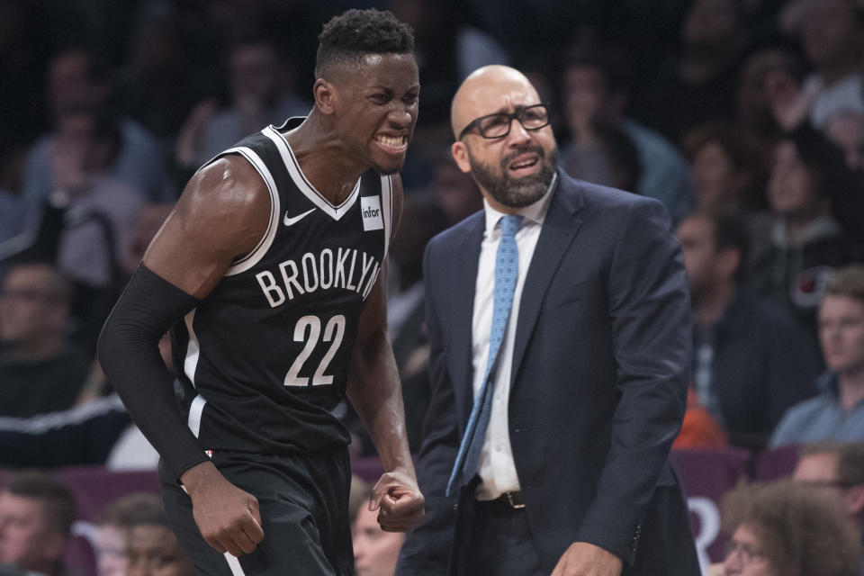 Brooklyn Nets guard Caris LeVert (22) and New York Knicks head coach David Fizdale react in the final minutes of the second half of an NBA basketball game, Friday, Oct. 19, 2018, in New York. (AP Photo/Mary Altaffer)