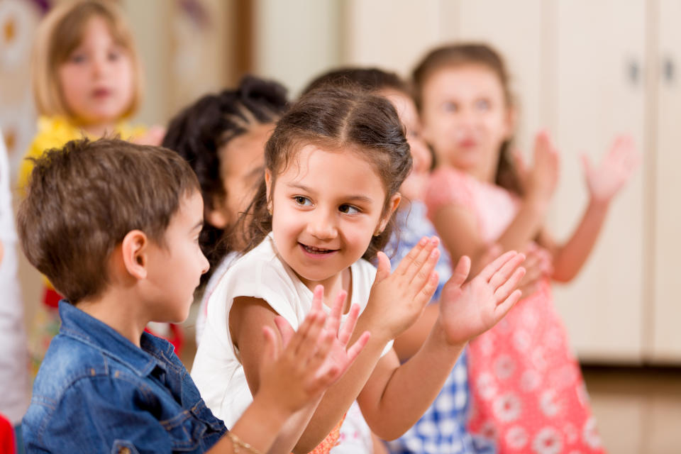 Preschool childs playing in classroom.