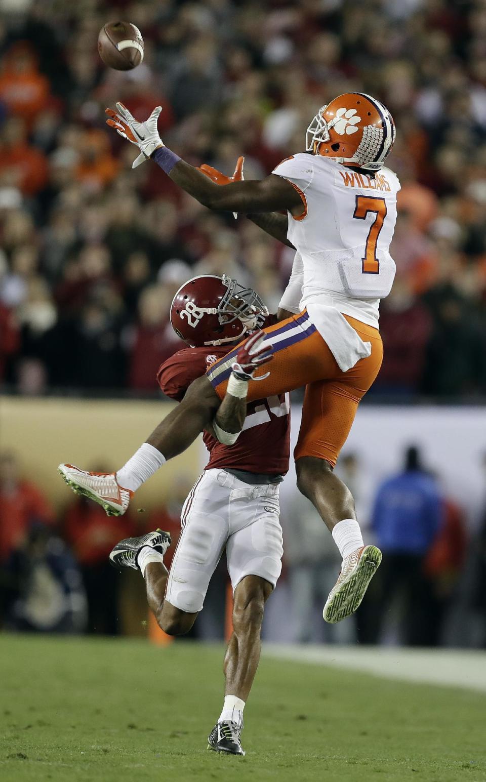 Clemson's Mike Williams catches a pass over Alabama's Anthony Averett during the second half of the NCAA college football playoff championship game Tuesday, Jan. 10, 2017, in Tampa, Fla. (AP Photo/Chris O'Meara)