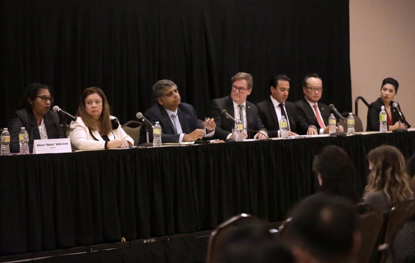 LOS ANGELES, CA - APRIL 27, 2022 - - Los Angeles City Attorney candidates Sherri Monica Valle Cole, from left, Hydee Feldstein Soto, Faisal Gill, Kevin James, Teddy Kapur, Richard Kim and Marina Torres participate in a forum in the Student Union at California State University, Los Angeles on April 27, 2022.The forum was presented by the Los Angeles Bar Association with The Criminal Justice Section and Co-Sponsors. (Genaro Molina / Los Angeles Times)