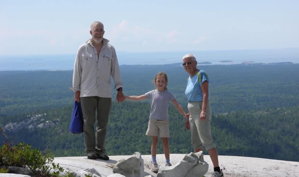 Jim and Sue Waddington with their granddaughter Emma on a trip to Ontario's Killarney Provincial Park in 2006. Emma narrates a new documentary on her grandparents' search for Group of Seven landscapes. (Submitted by Jim and Sue Waddington - image credit)