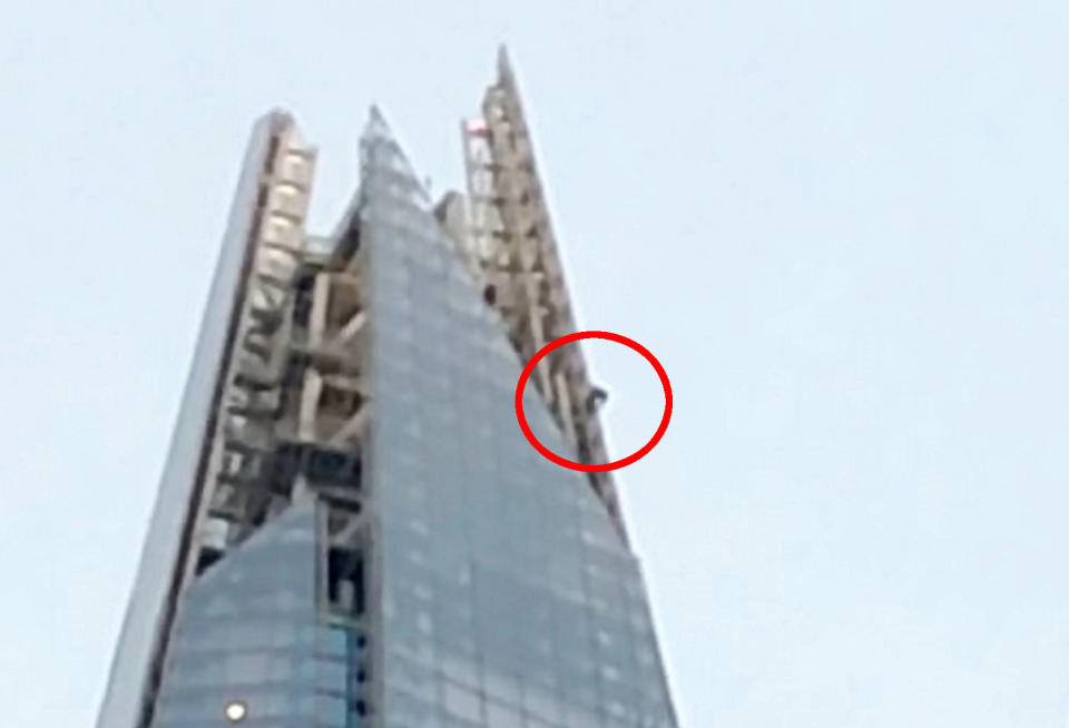 The climber was spotted scaling The Shard early in the morning on Sunday. (SWNS)