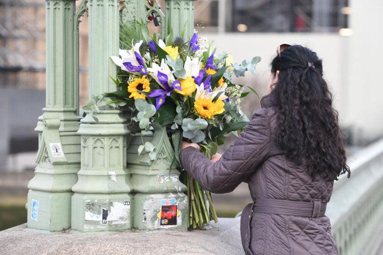 Westminster mourns victims one year on... as Amber Rudd targets terror recruiters