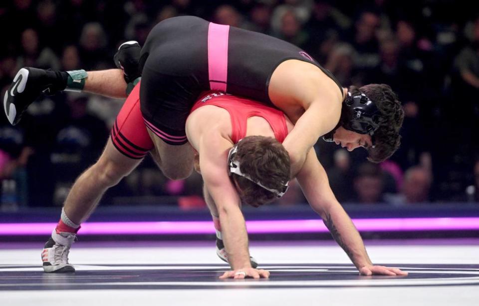 Penn State’s Aaron Nagao wrestles Rutgers’ Dylan Shawver in the 133 lb bout of the match on Monday, February. 12, 2024 at the Bryce Jordan Center.