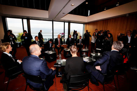 Participants take their place at the opening of the Strategic Dialogue of the Western Balkans meeting at the World Economic Forum (WEF) in Cologny near Geneva, Switzerland, October 2, 2018. REUTERS/Denis Balibouse